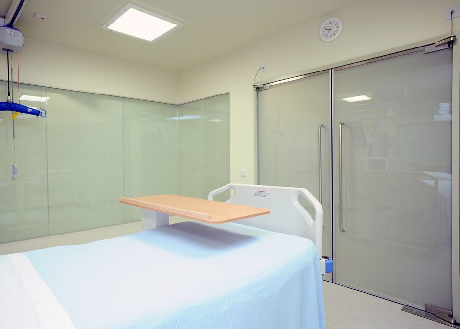 Hospital room with bed and table