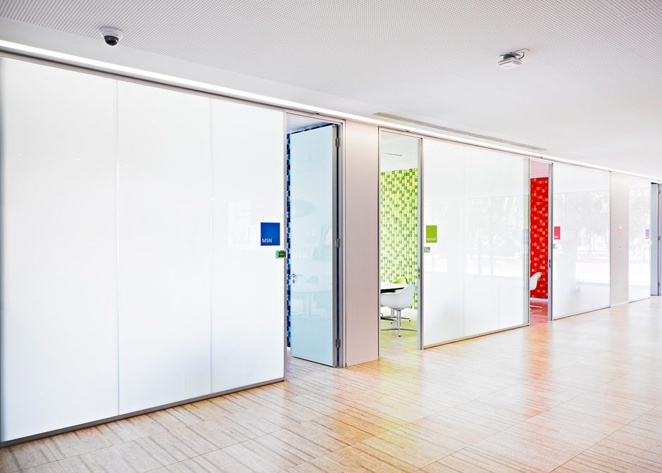 Bright corridor with patterned room dividers