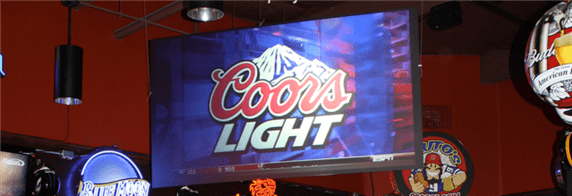 Coors Light sign in a bar