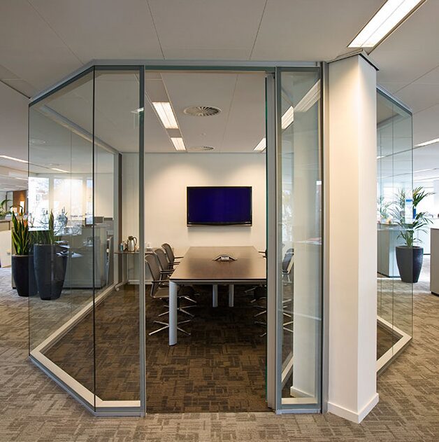 Contemporary conference room with TV screen.
