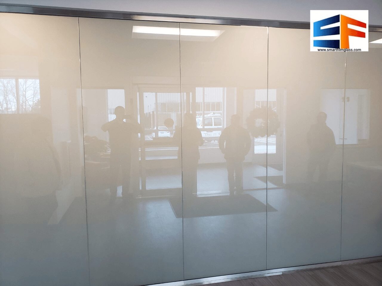Office reflection on glass panels